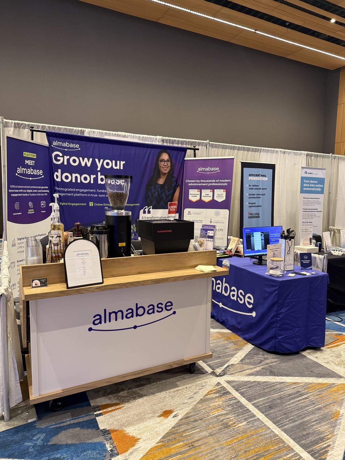 The Cafecito Sol coffee cart set up at a corporate conference booth